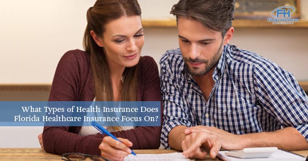 Couple choosing health insurance option